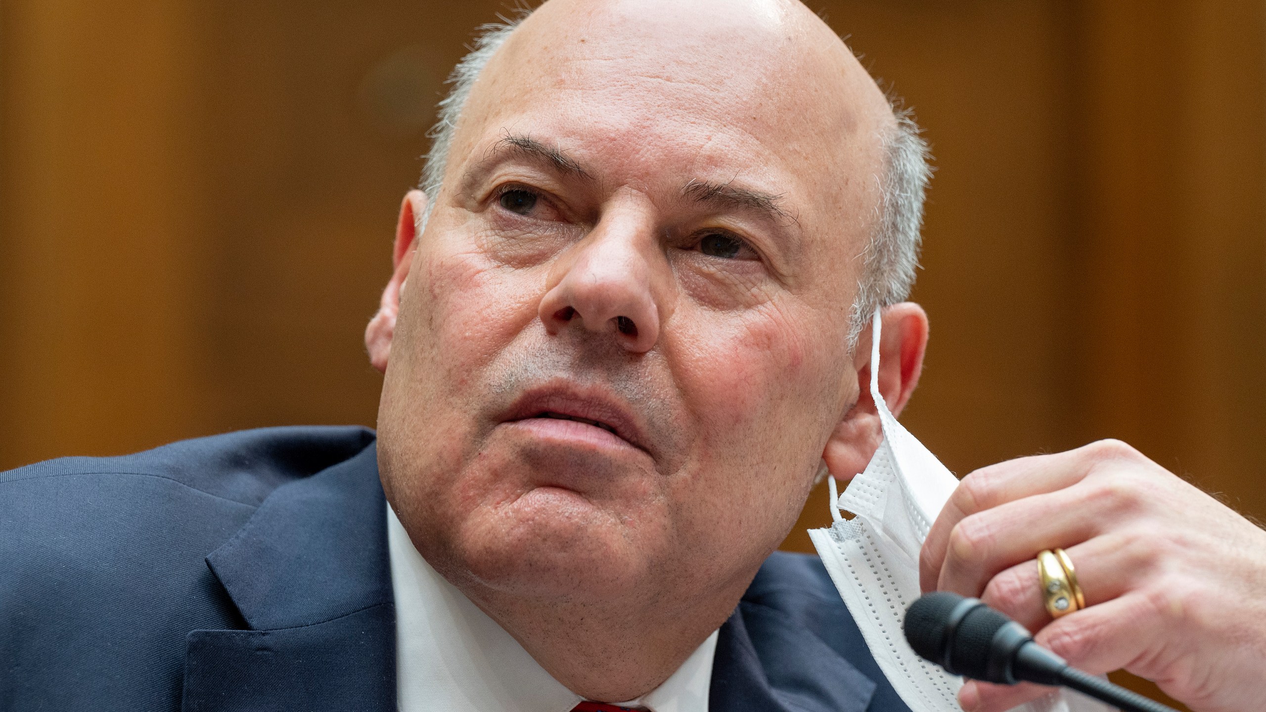 United States Postal Service Postmaster General Louis DeJoy speaks during a House Oversight and Reform Committee hearing, Feb. 24, 2021, in Washington. (Jim Watson/Pool via AP, File)