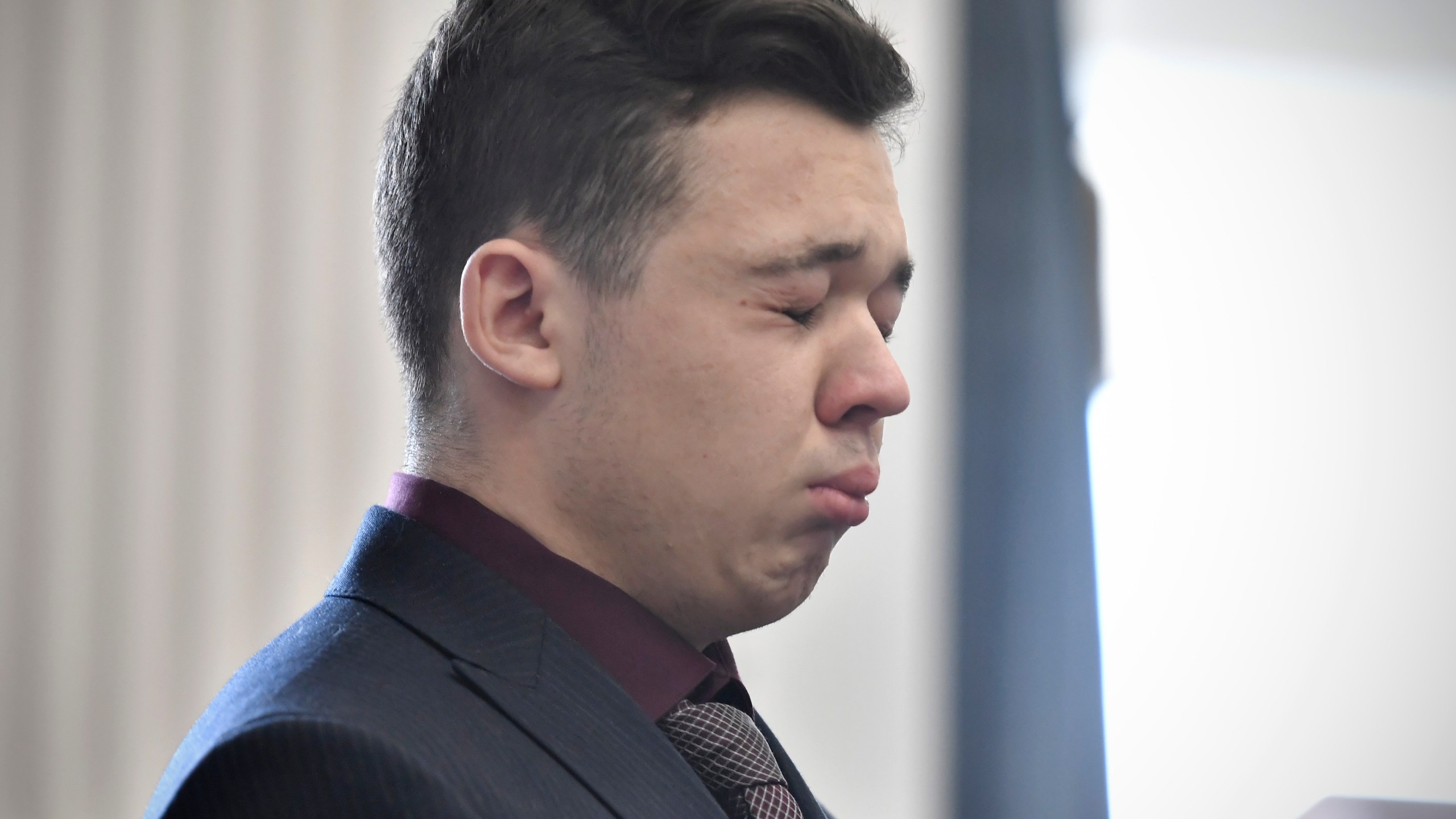 Kyle Rittenhouse closes his eyes and cries as he is found not guilt on all counts at the Kenosha County Courthouse in Kenosha, Wis., on Friday, Nov. 19, 2021. The jury came back with its verdict afer close to 3 1/2 days of deliberation. (Sean Krajacic/The Kenosha News via AP, Pool)