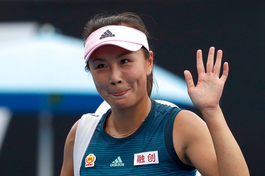 China's Peng Shuai waves after losing to Canada Eugenie Bouchard in their first round match at the Australian Open tennis championships in Melbourne, Australia on Jan. 15, 2019. (AP Photo/Mark Schiefelbein, File)