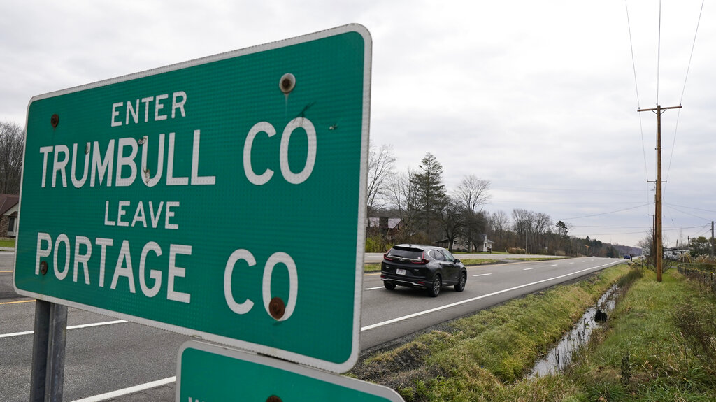 A car enters Trumbull County, Wednesday, in this photo from Nov. 17, 2021, near Warren, Ohio. Three retail pharmacy chains recklessly distributed massive amounts of pain pills in two Ohio counties, a federal jury said Tuesday, Nov. 23, 2021, in a verdict that could set the tone for U.S. city and county governments that want to hold pharmacies accountable for their roles in the opioid crisis. (AP Photo/Tony Dejak)