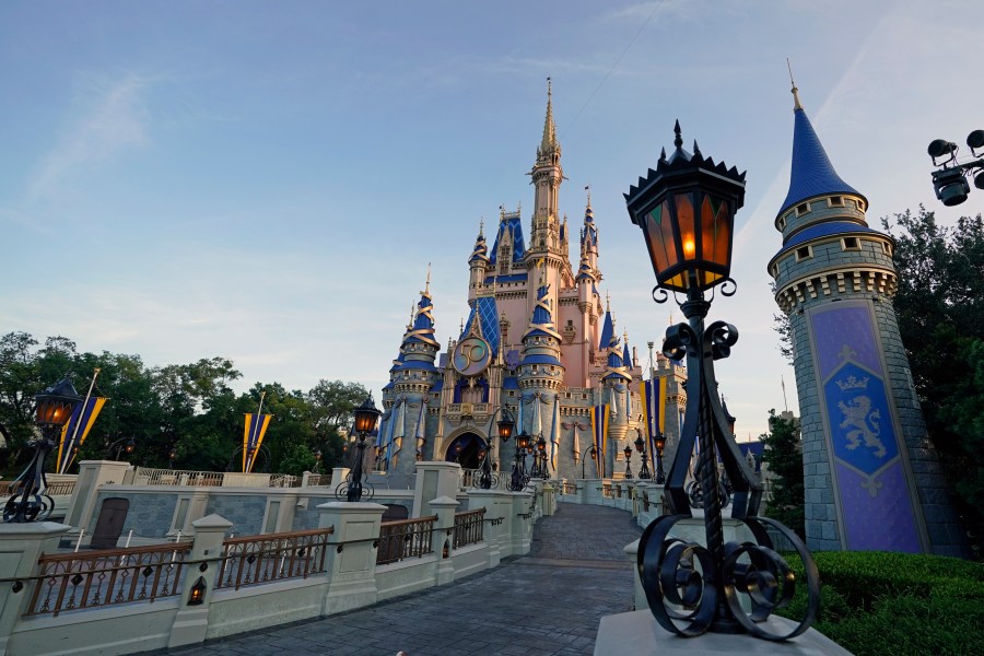 The Cinderella Castle at the Magic Kingdom at Walt Disney World is seen at the theme park, Aug. 30, 2021, in Lake Buena Vista, Fla. Disney has paused its policy requiring Florida-based employees to take the COVID-19 vaccine following new laws passed by the state's legislature last week that limit employers' power to require vaccinations, according to a memo sent to employees. The company informed employees in a memo sent Friday that it has paused the requirement due to the state legislature's action during a special session last week, and because of an appeal court's temporary delay of federal vaccination guidelines from the Occupational Safety and Health Administration, the Orlando Sentinel reported. (AP Photo/John Raoux, file)