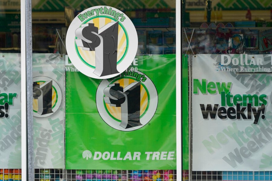 Dollar Tree store logos indicating that everything in the store is for $1 are promoted on a storefront window on Feb. 25, 2021, in Jackson, Miss. (AP Photo/Rogelio V. Solis, File)