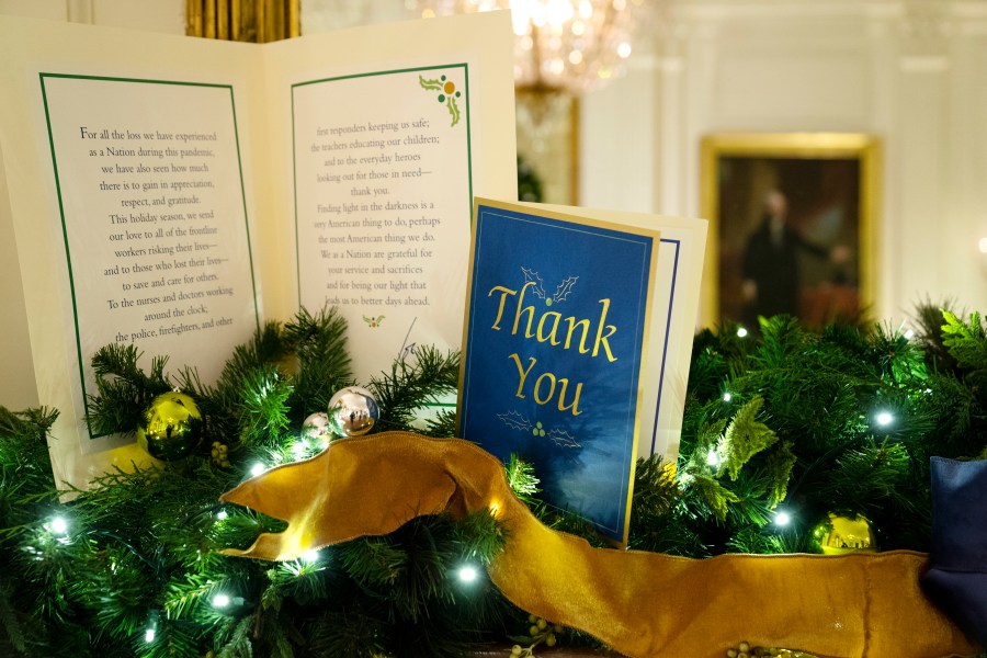 The East Room of the White House is decorated for the holiday season during a press preview of the White House holiday decorations, Monday, Nov. 29, 2021, in Washington. (AP Photo/Evan Vucci)