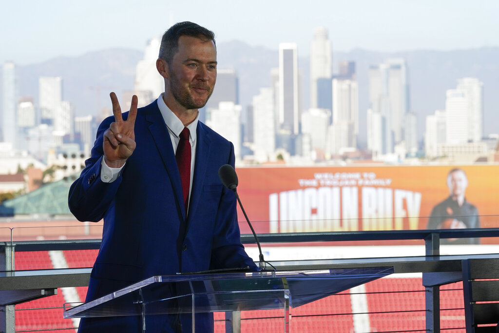 Lincoln Riley, the new head football coach of the University of Southern California, speaks during a ceremony in Los Angeles, Monday, Nov. 29, 2021. (AP Photo/Ashley Landis)