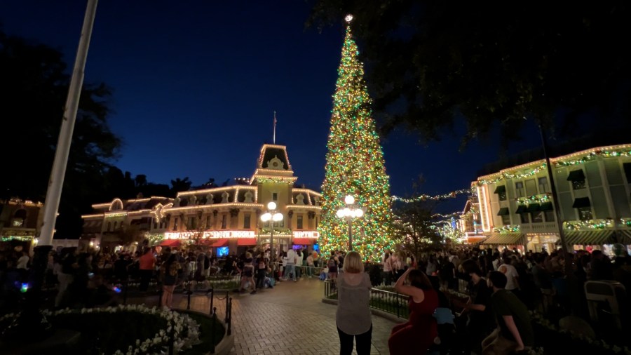 The Christmas tree on Disneyland's Main Street is lit up on Nov. 13, 2021. (KTLA)