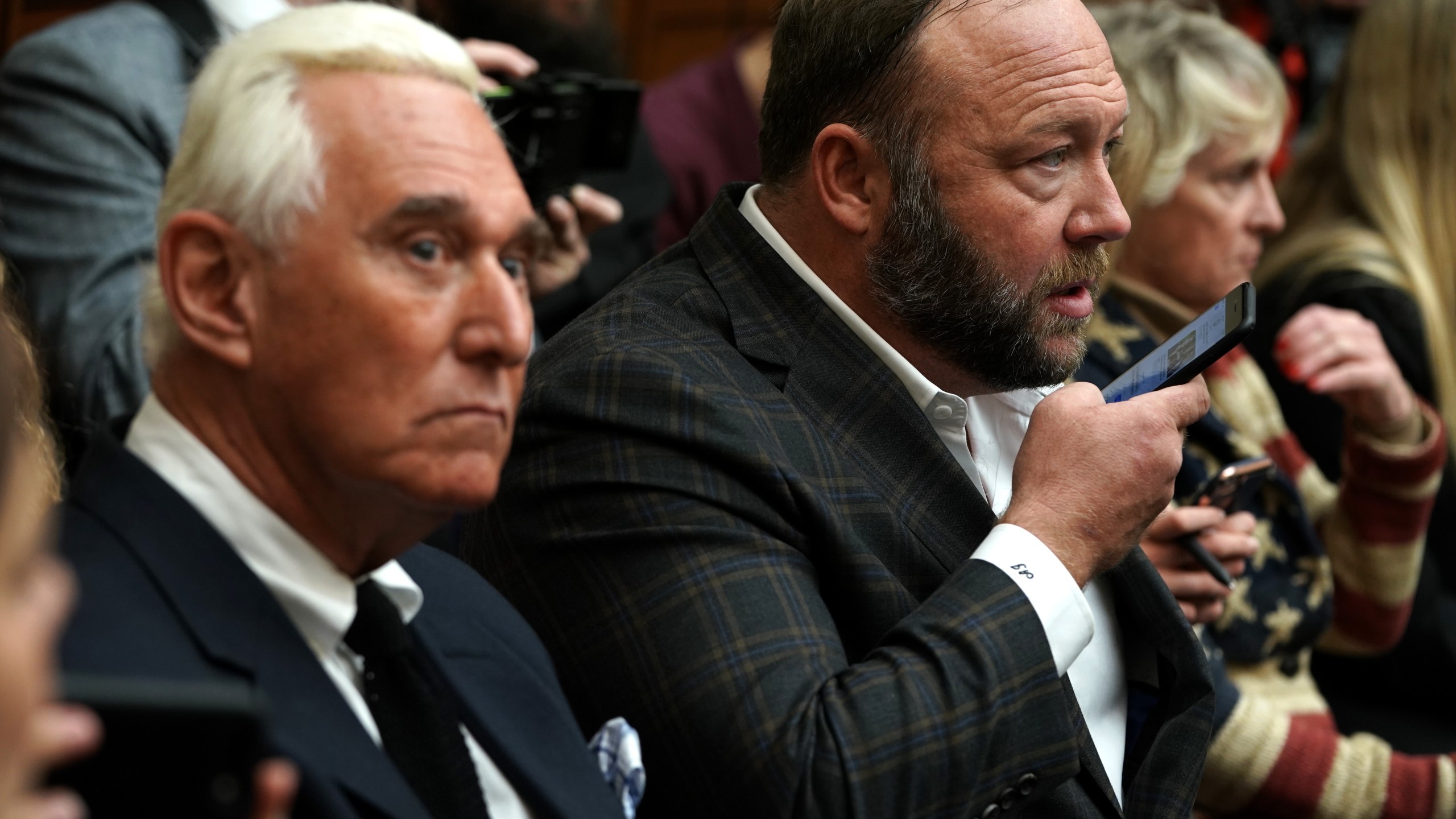 Longtime informal adviser to President Trump Roger Stone and Alex Jones of Infowars attend the testimony of Google CEO Sundar Pichai before the House Judiciary Committee at the Rayburn House Office Building on Dec. 11, 2018. (Alex Wong/Getty Images)