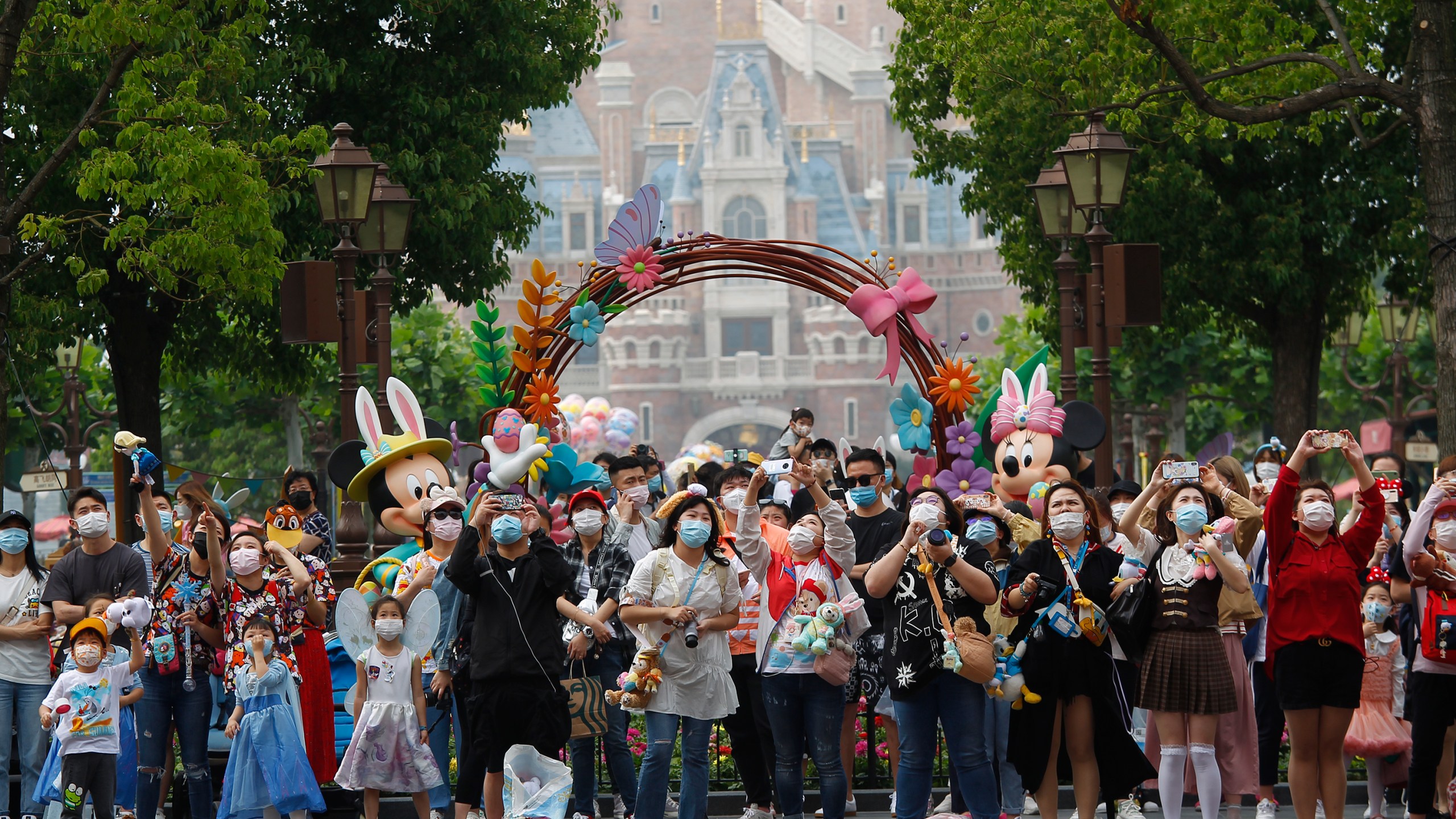 Tourists visit Shanghai Disneyland after its reopening on May 11, 2020 in Shanghai, China. (Hu Chengwei/Getty Images)