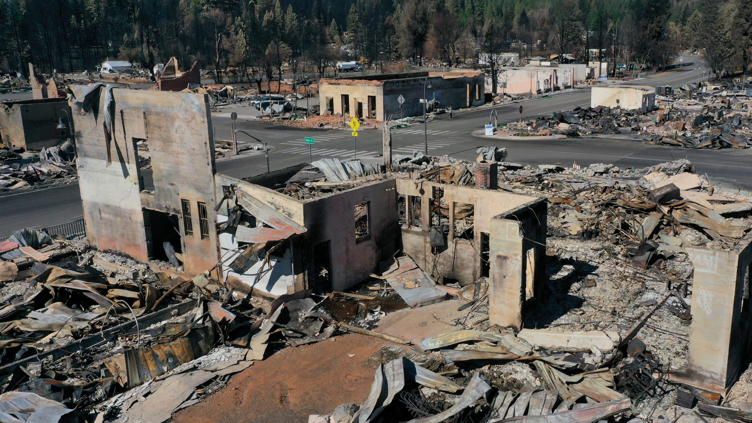 In an aerial view, the remains of homes and businesses that were destroyed by the Dixie Fire are visible on Sept. 24, 2021 in Greenville, California. (Justin Sullivan/Getty Images)