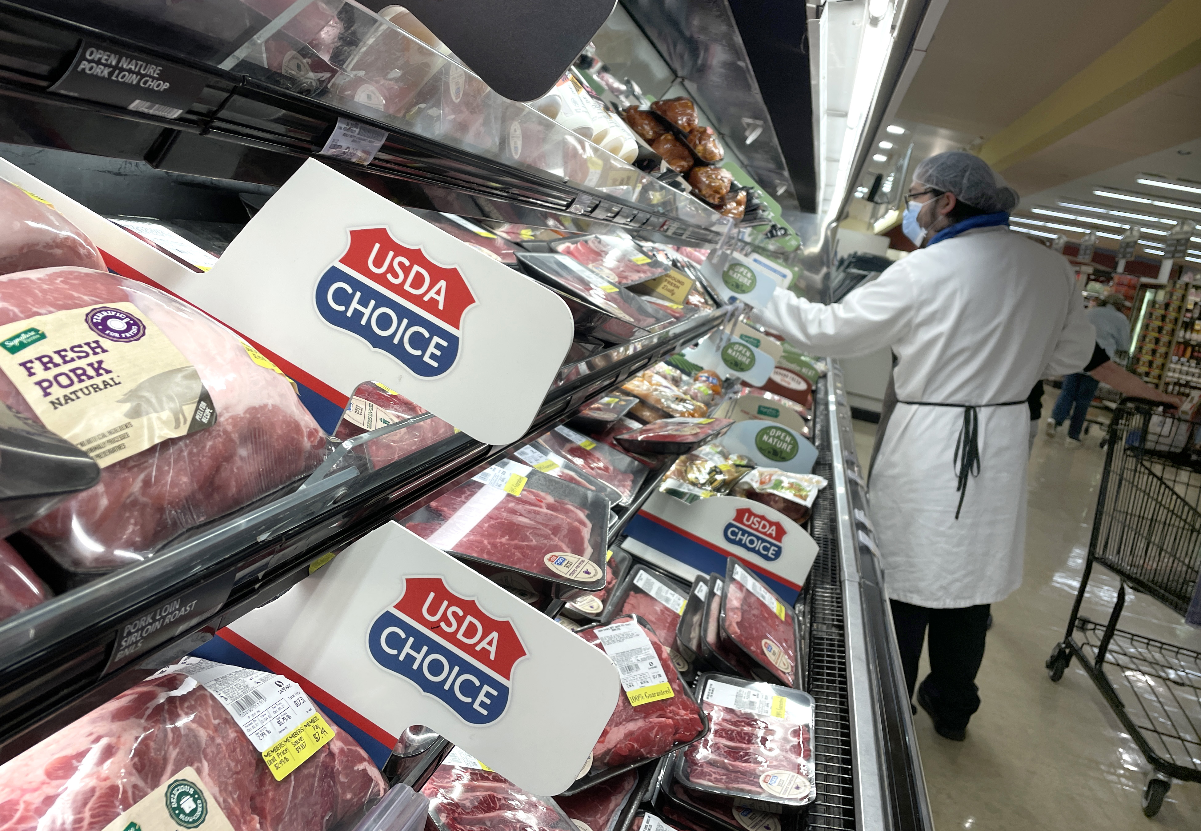 Pork and beef products are displayed on a shelf at a store on Oct. 4, 2021 in San Francisco. The price for meat at the grocery stores has surged over the past year. (Justin Sullivan/Getty Images)