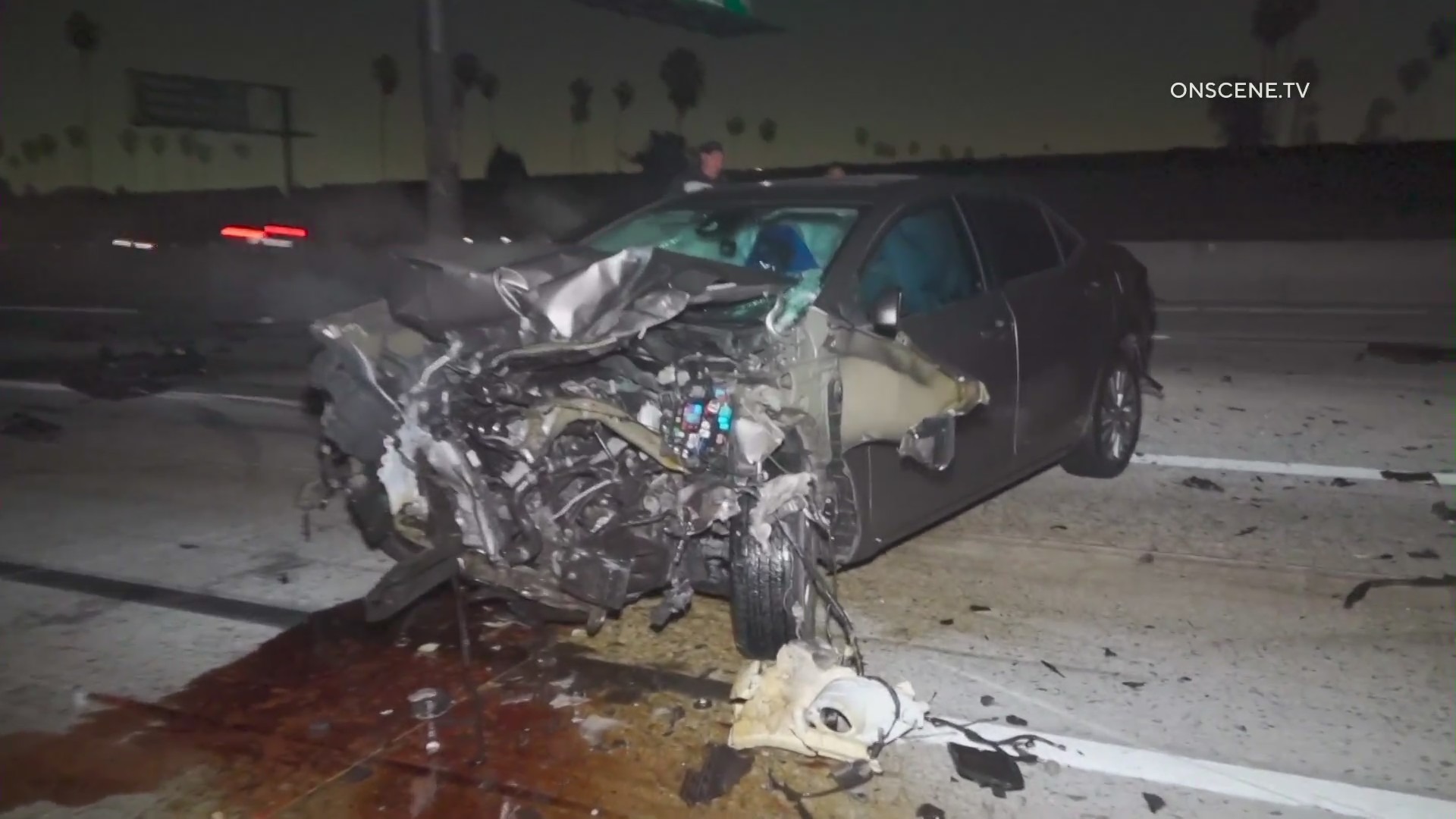 A damaged vehicle is seen after a crash on the 110 Freeway in South L.A. on Nov. 30, 2021. (Onscene)