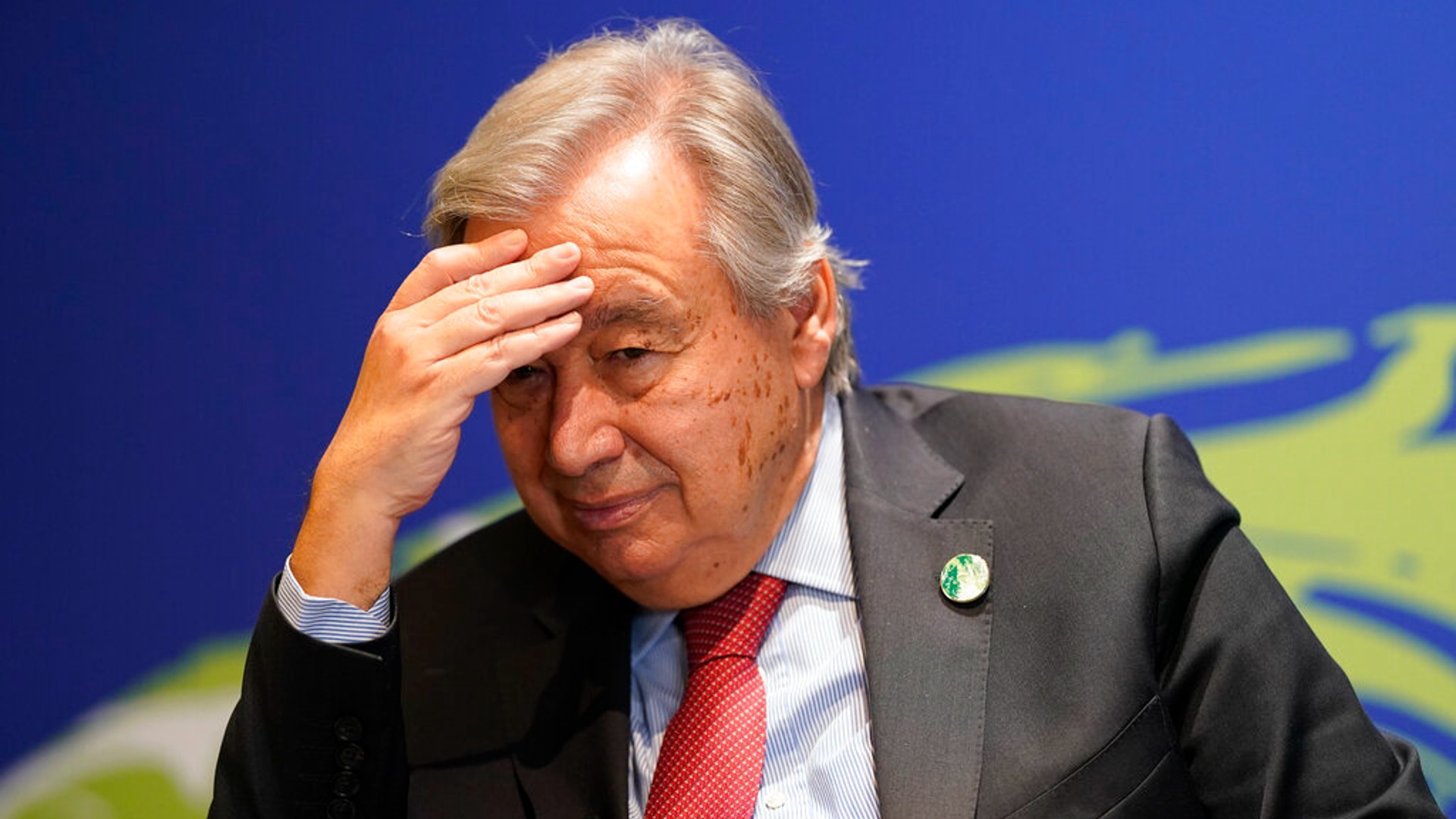 UN Secretary-General Antonio Guterres gestures during an interview at the COP26 U.N. Climate Summit in Glasgow, Scotland, Thursday, Nov. 11, 2021. (AP Photo/Alberto Pezzali)