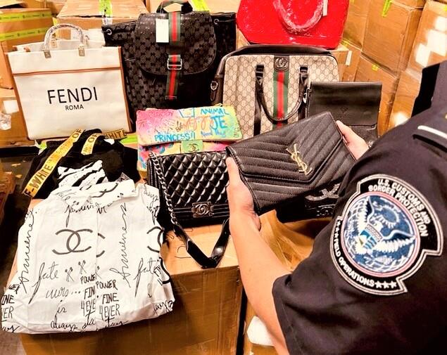 CBP in Los Angeles  on Dec. 2, 2021 released this image of counterfeit designer bags that arrived in a cargo shipment from China.