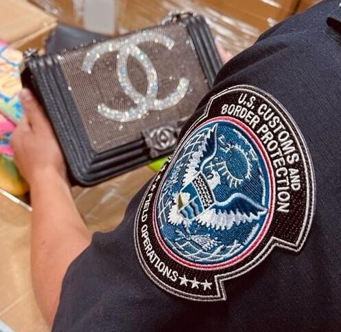 CBP in Los Angeles  on Dec. 2, 2021 released this image of counterfeit designer bags that arrived in a cargo shipment from China.