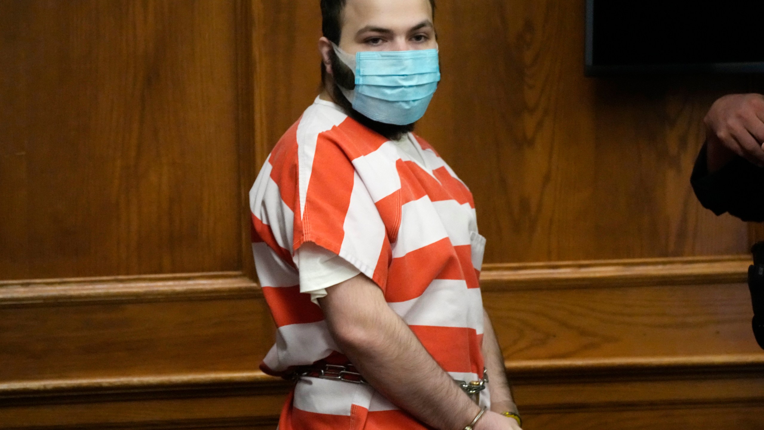 Ahmad Al Aliwi Alissa, accused of killing 10 people at a Colorado supermarket in March, is led into a courtroom for a hearing on Sept. 7, 2021, in Boulder, Colo. Experts have found Alissa is mentally incompetent to proceed in the case, attorneys said during a court hearing on Dec. 3, 2021. (David Zalubowski/Pool, Associated Press)