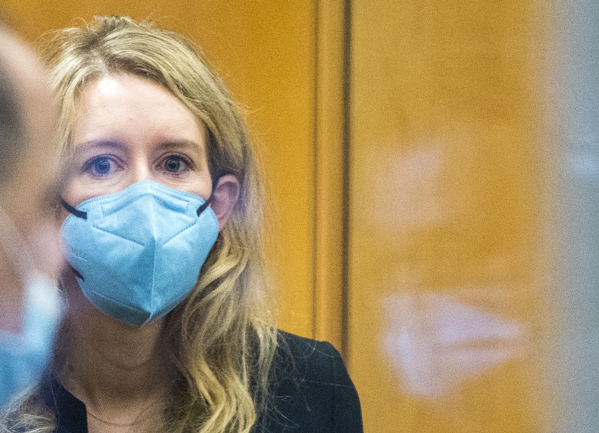 Elizabeth Holmes walks into federal court in San Jose on Dec. 16, 2021. (Nic Coury/Associated Press)