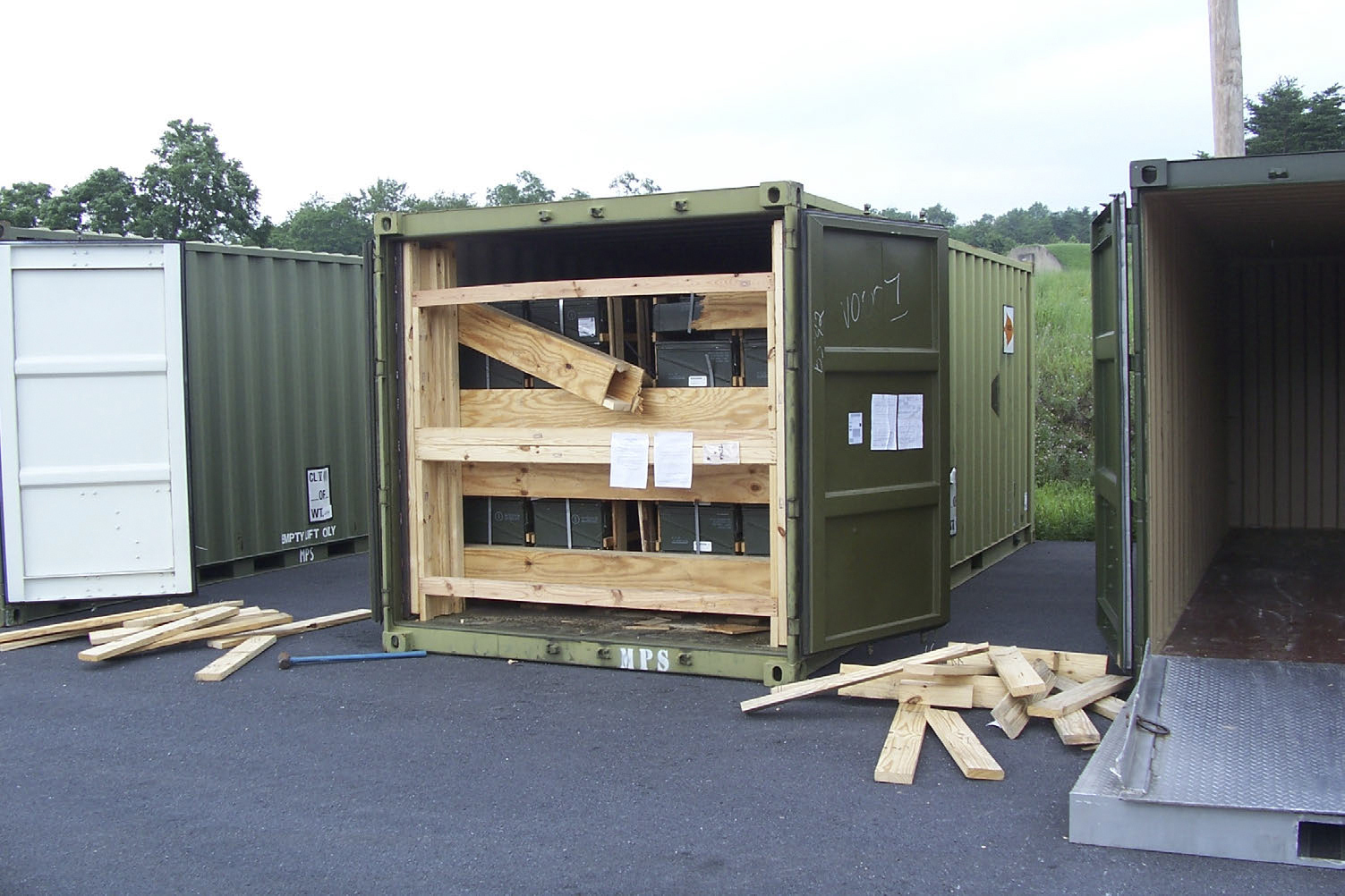 In this July 13, 2017, image provided by the U.S. Army Criminal Investigation Command, a storage container of explosive ordnance shows signs of theft after arriving at the Letterkenny Army Depot in Chambersburg, Pa. An ammunition canister containing 32 rounds of 40mm M430A1 grenades, property of the U.S. Marine Corps, was missing. (U.S. Army Criminal Investigation Command via AP, File)