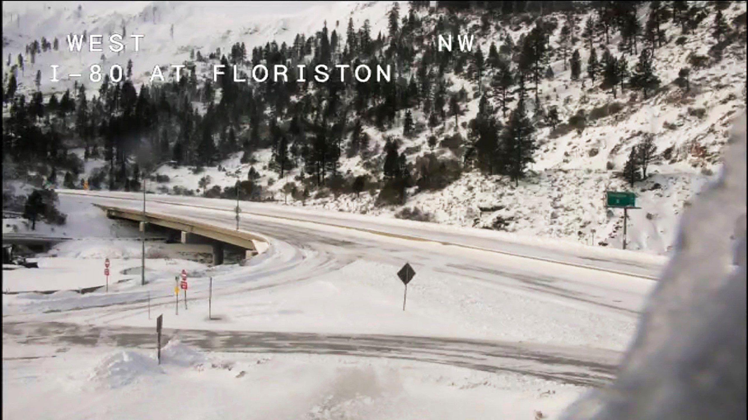 This image from video provided by Caltrans District 3 shows a closed westbound I-80 on Sunday, Dec. 26, 2021. The road from Colfax, Calif., to the Nevada state line was closed due to heavy snowfall. (Caltrans District 3, via AP)