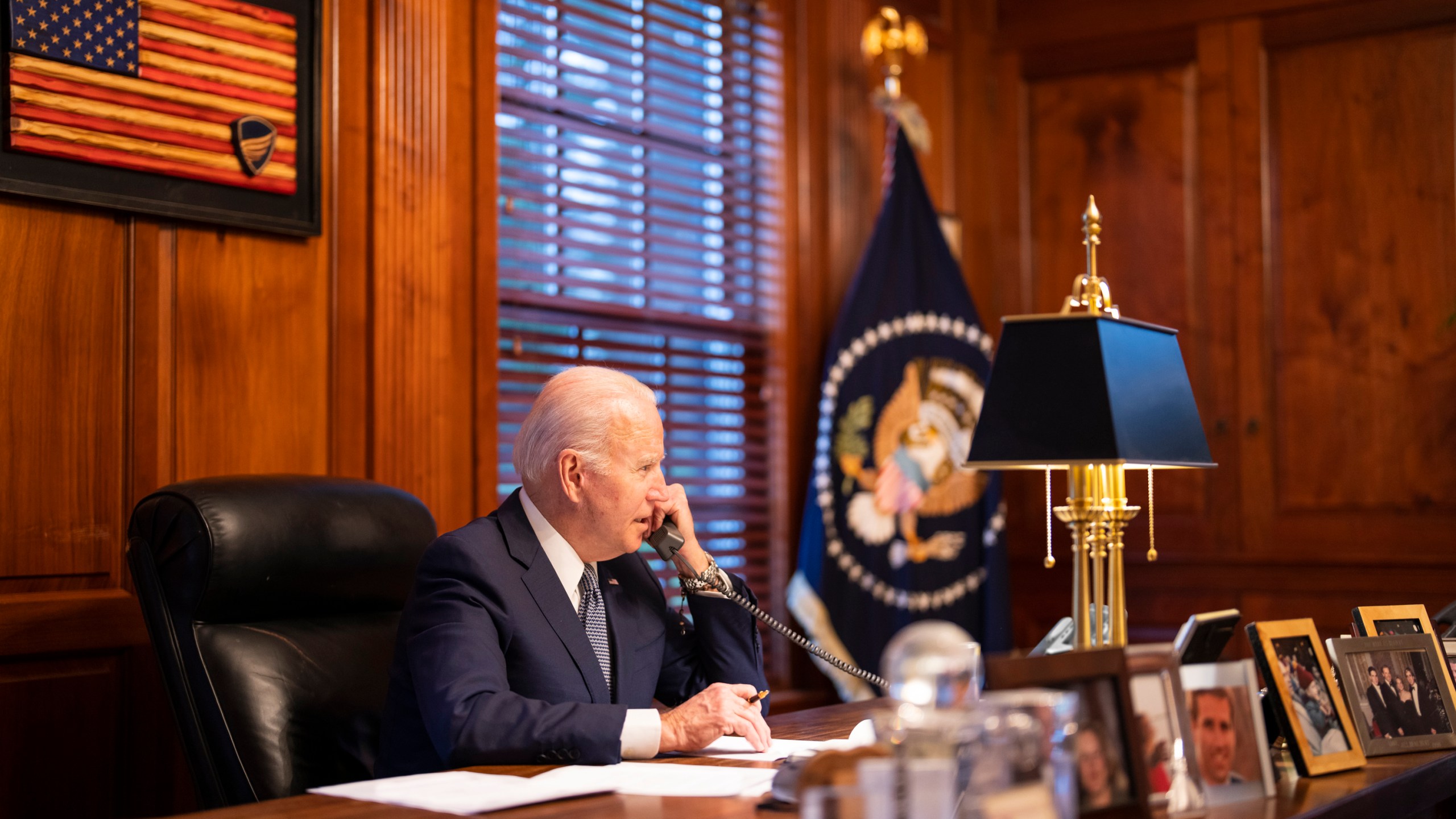 In this image provided by The White House, President Joe Biden speaks with Russian President Vladimir Putin on the phone from his private residence in Wilmington, Del., on Dec. 30, 2021. (Adam Schultz/The White House via AP)