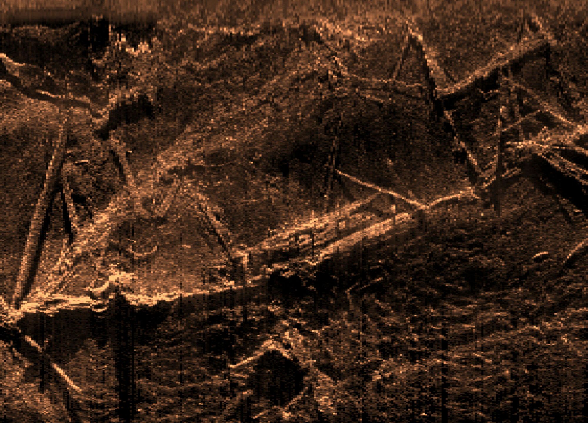 This sonar image created by SEARCH Inc. and released by the Alabama Historical Commission shows the remains of the Clotilda, the last known U.S. ship involved in the trans-Atlantic slave trade. Researchers studying the wreckage have made the surprising discovery that most of the wooden schooner remains intact in a river near Mobile, Ala. including the pen that was used to imprison African captives during the brutal journey across the Atlantic Ocean. (Alabama Historical Commission via AP)