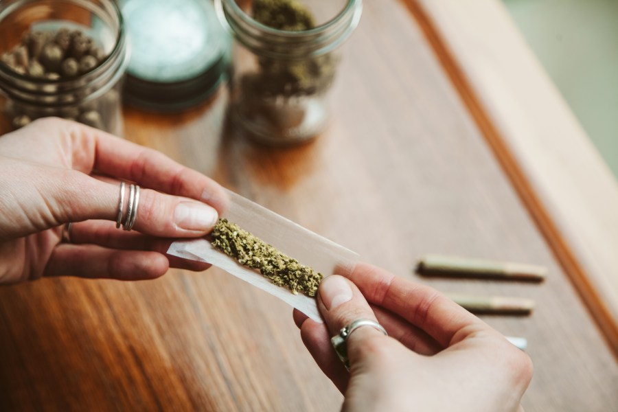 A budtender rolls a joint at cannabis dispensary in this undated file photo. (Getty Images)