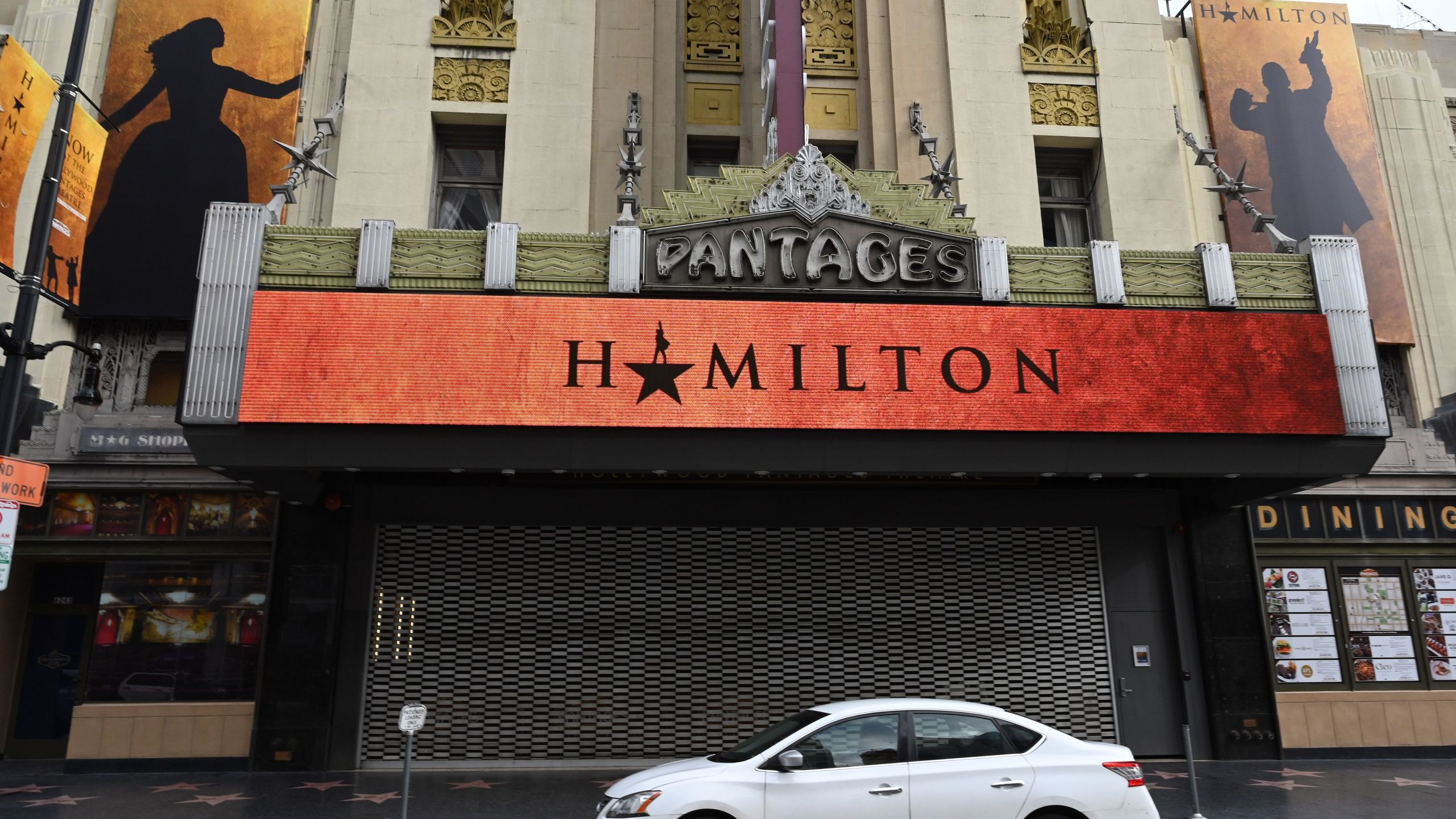 The marquee of the shuttered Pantages Theater announces the musical "Hamilton", March 15, 2020, in Hollywood, California. (ROBYN BECK/AFP via Getty Images)