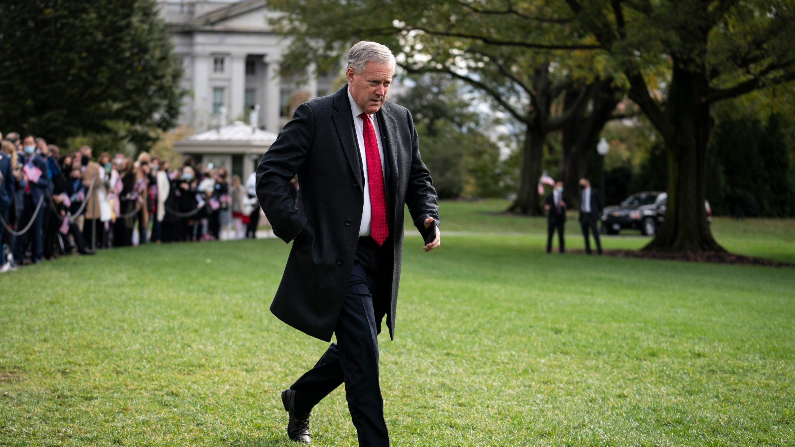 White House Chief of Staff Mark Meadows walks along the South Lawn before President Donald Trump departs from the White House on Oct. 30, 2020. (Sarah Silbiger/Getty Images)