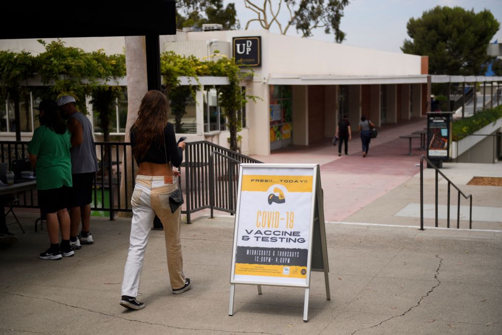 Free COVID-19 vaccine and testing signage is displayed at the California State University Long Beach (CSULB) campus on August 11, 2021. (PATRICK T. FALLON/AFP via Getty Images)