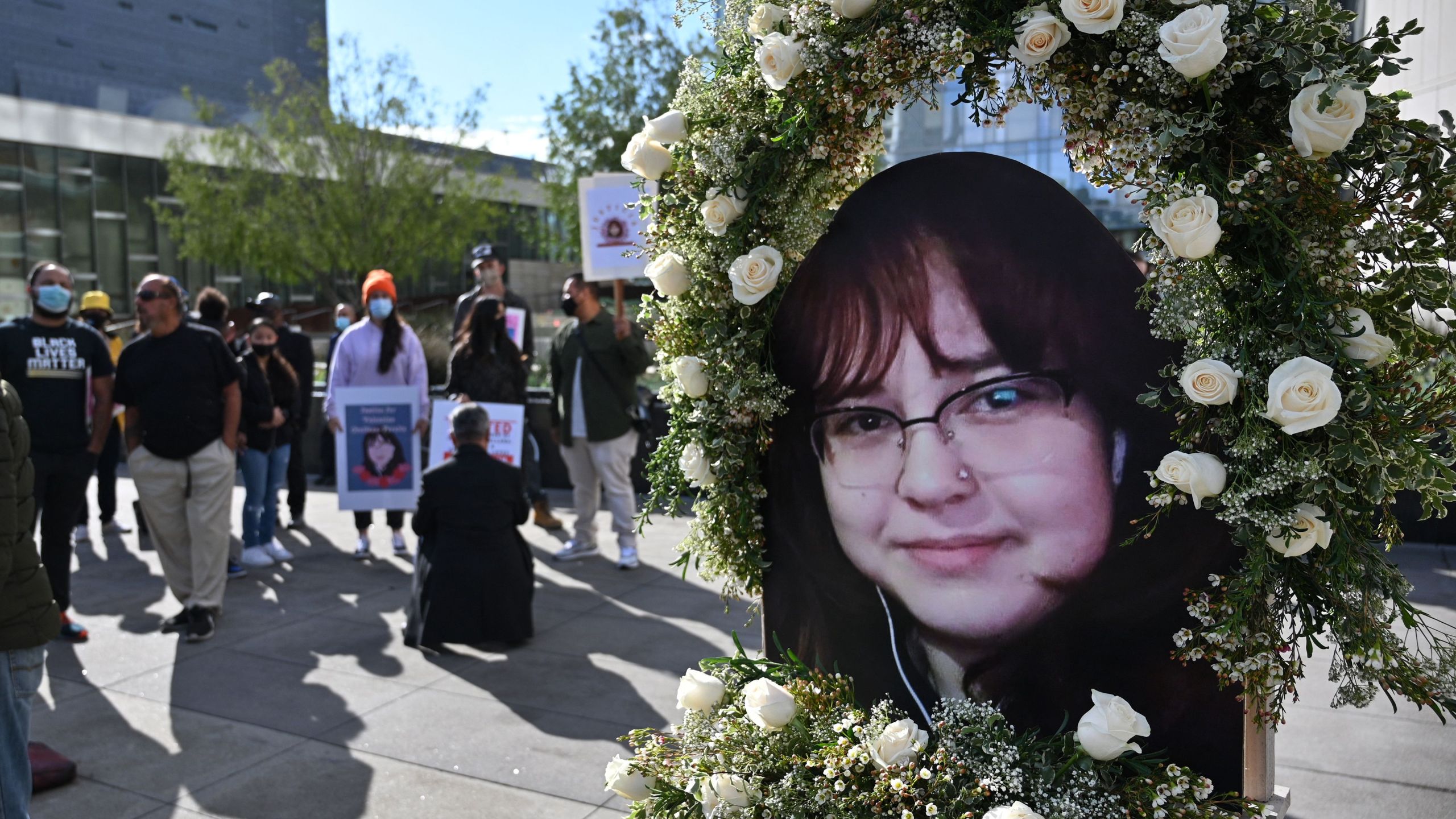 A photo of 14-year old Valentina Orellana-Peralta, who was killed by a stray police bullet while shopping with her mother at a clothing store, is seen at a press conference outside Los Angeles Police Department headquarters on Dec. 28, 2021. (Robyn Beck/AFP via Getty Images)