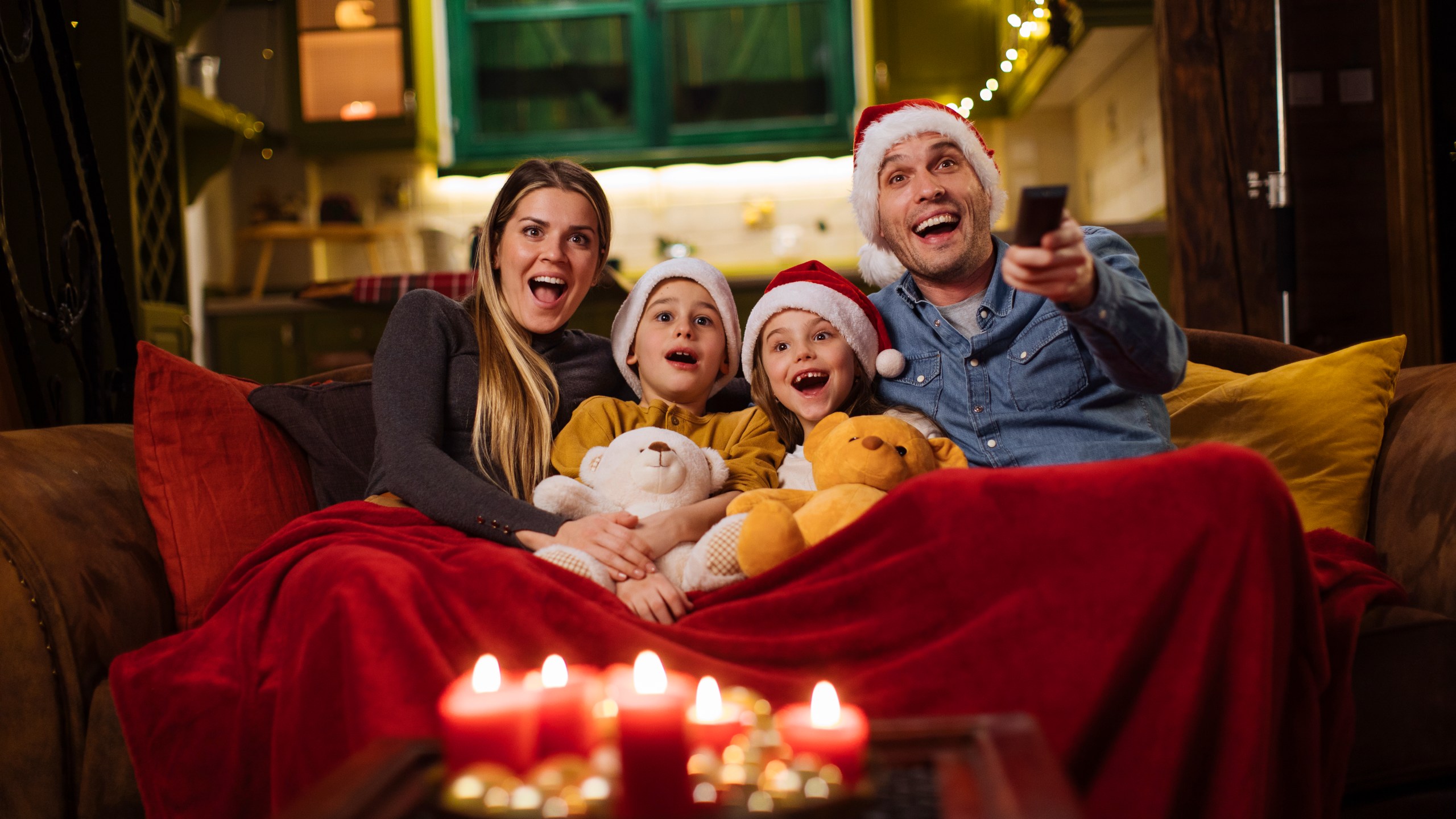 A family is seen watching a Christmas movie in an undated photo. (Getty Images)