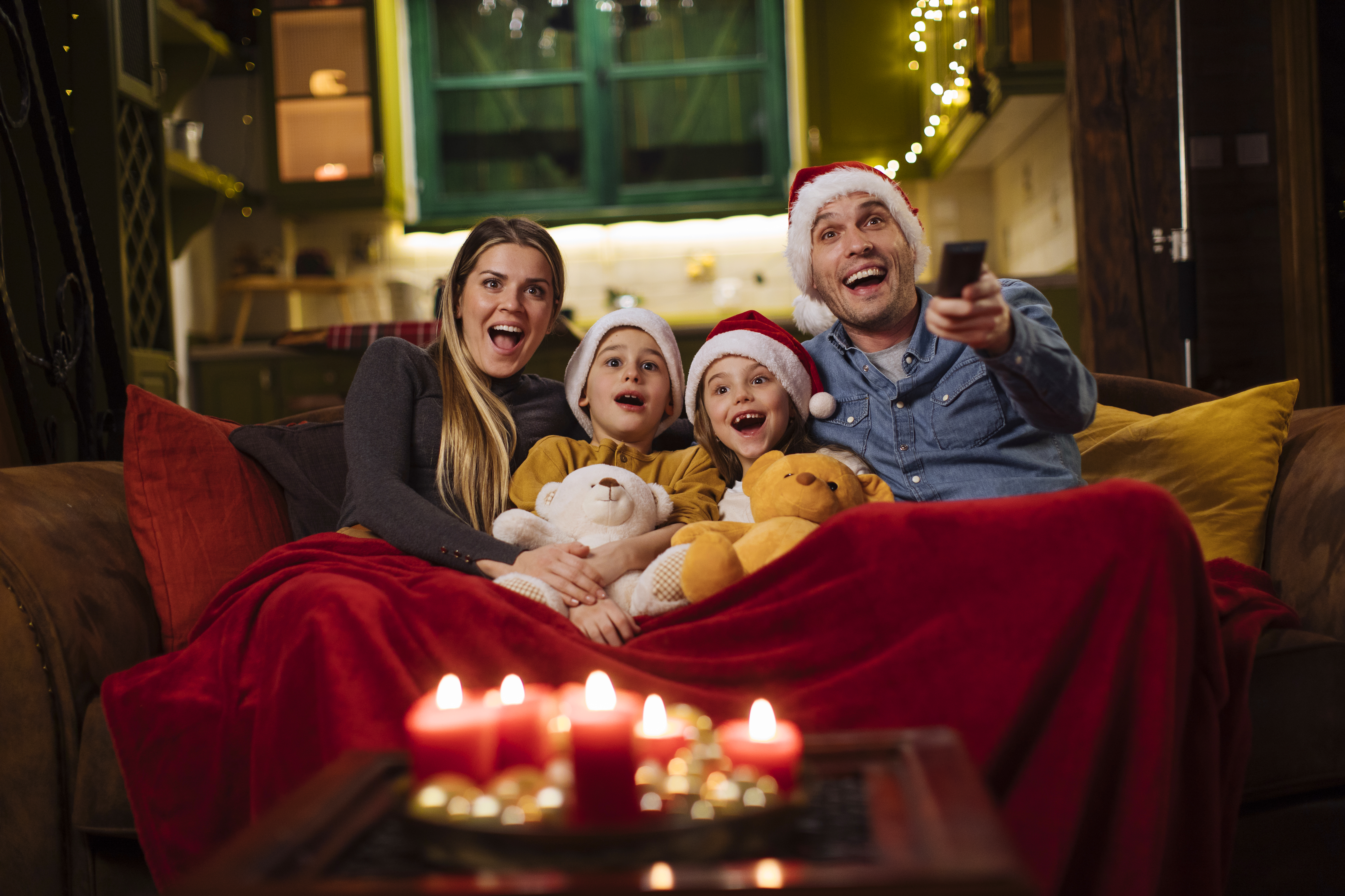 A family is seen watching a Christmas movie in an undated photo. (Getty Images)