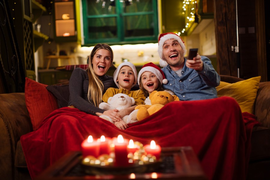 A family is seen watching a Christmas movie in an undated photo. (Getty Images)