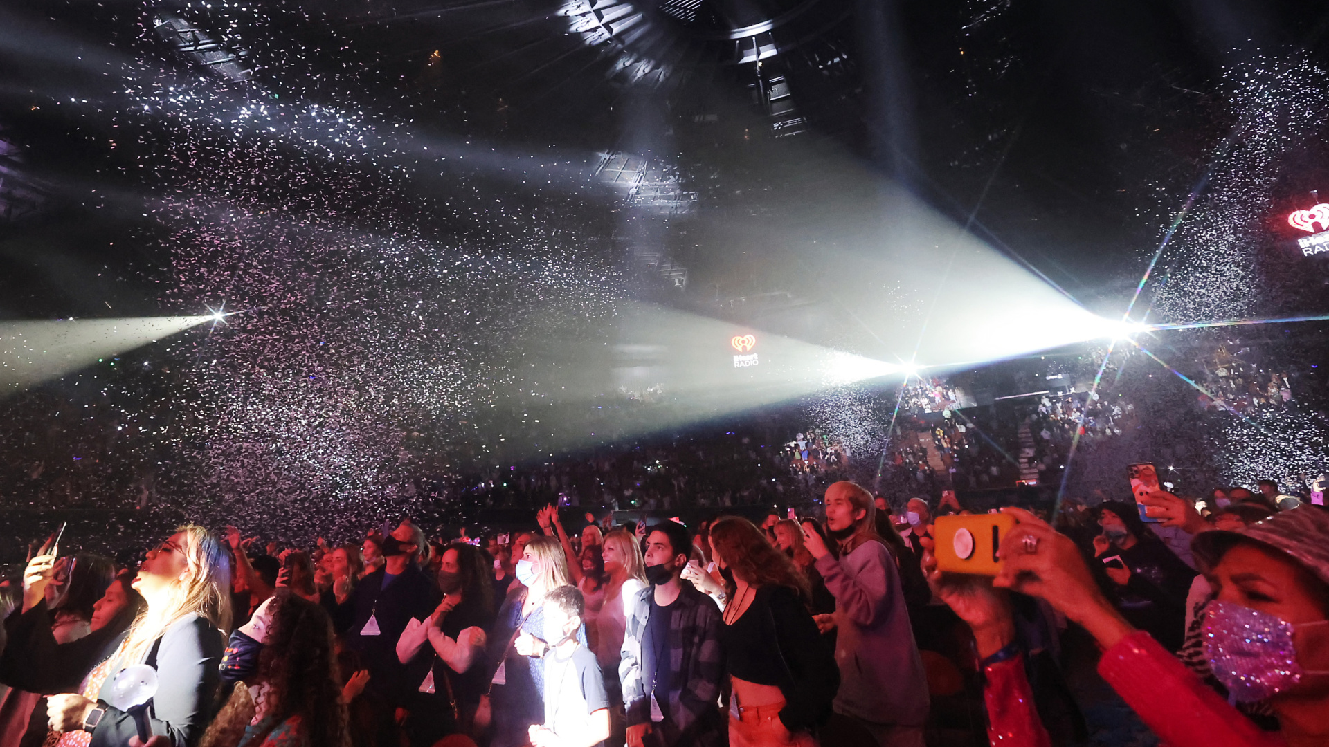 Concert-goers watch Black Eyed Peas perform onstage at The Forum on Dec. 3, 2021 in Los Angeles, California. (Emma McIntyre/Getty Images for iHeartRadio)