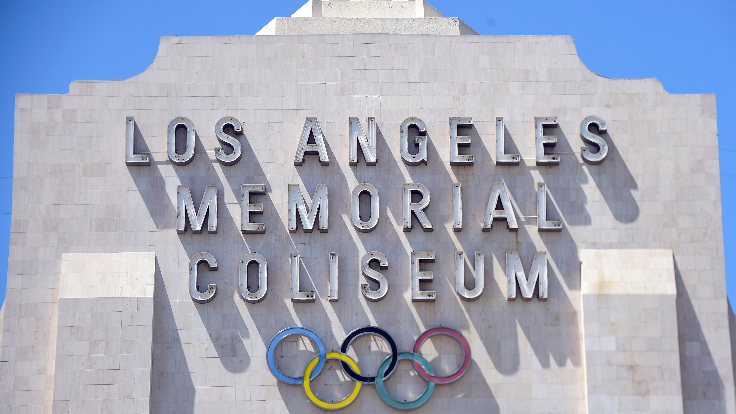 The entrance to the Los Angeles Coliseum, which hosted the 1932 and 1984 Summer Olympics, is shown in Aug. 31, 2015. (FREDERIC J. BROWN/AFP via Getty Images)