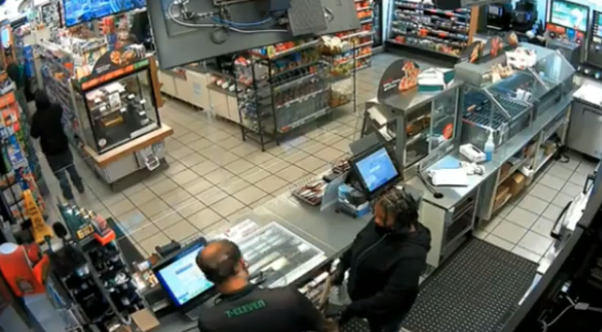 A still from surveillance video shared by LAPD on Dec. 21, 2021 shows a robbery that occurred in late November.