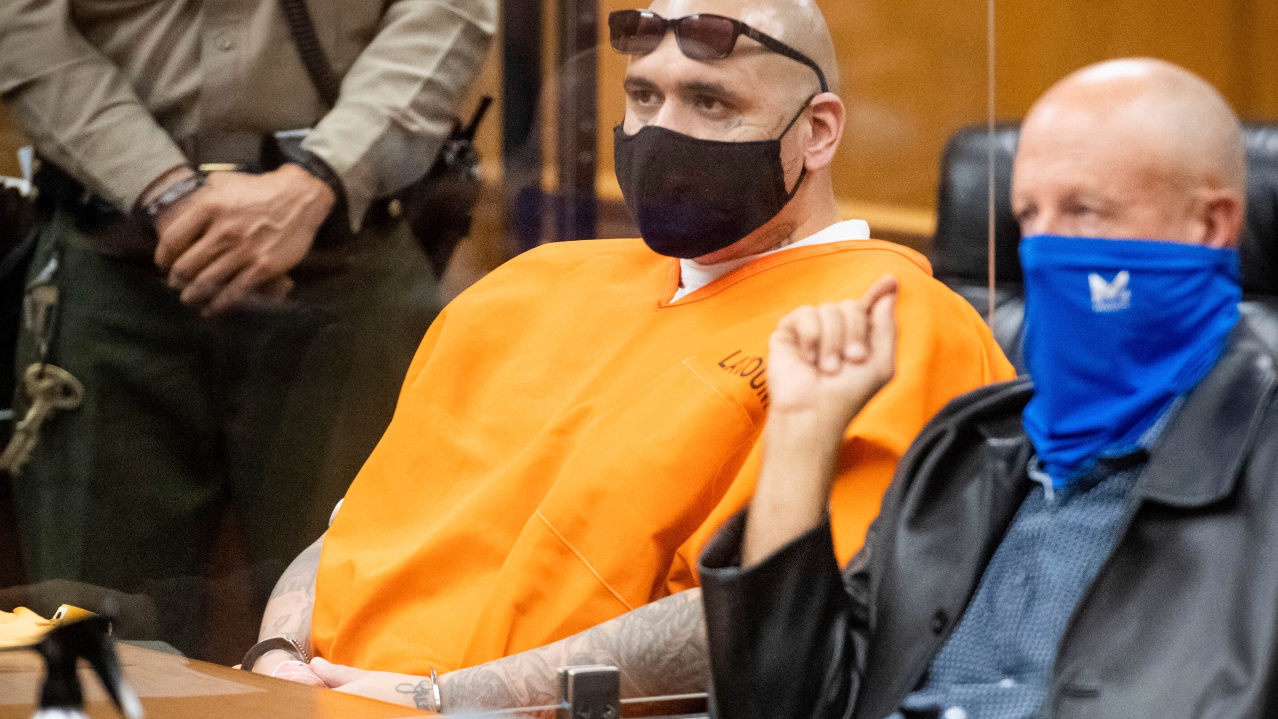 Michael Christopher Mejia and his attorney Paul Cohen listen to Judge Roger Ito during Mejia's sentencing hearing at Norwalk Superior Court on Wednesday, Dec. 1, 2021, in Norwalk, Calif. (Sarah Reingewirtz/The Orange County Register via AP)