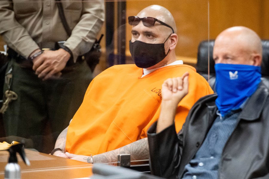 Michael Christopher Mejia and his attorney Paul Cohen listen to Judge Roger Ito during Mejia's sentencing hearing at Norwalk Superior Court on Wednesday, Dec. 1, 2021, in Norwalk, Calif. (Sarah Reingewirtz/The Orange County Register via AP)