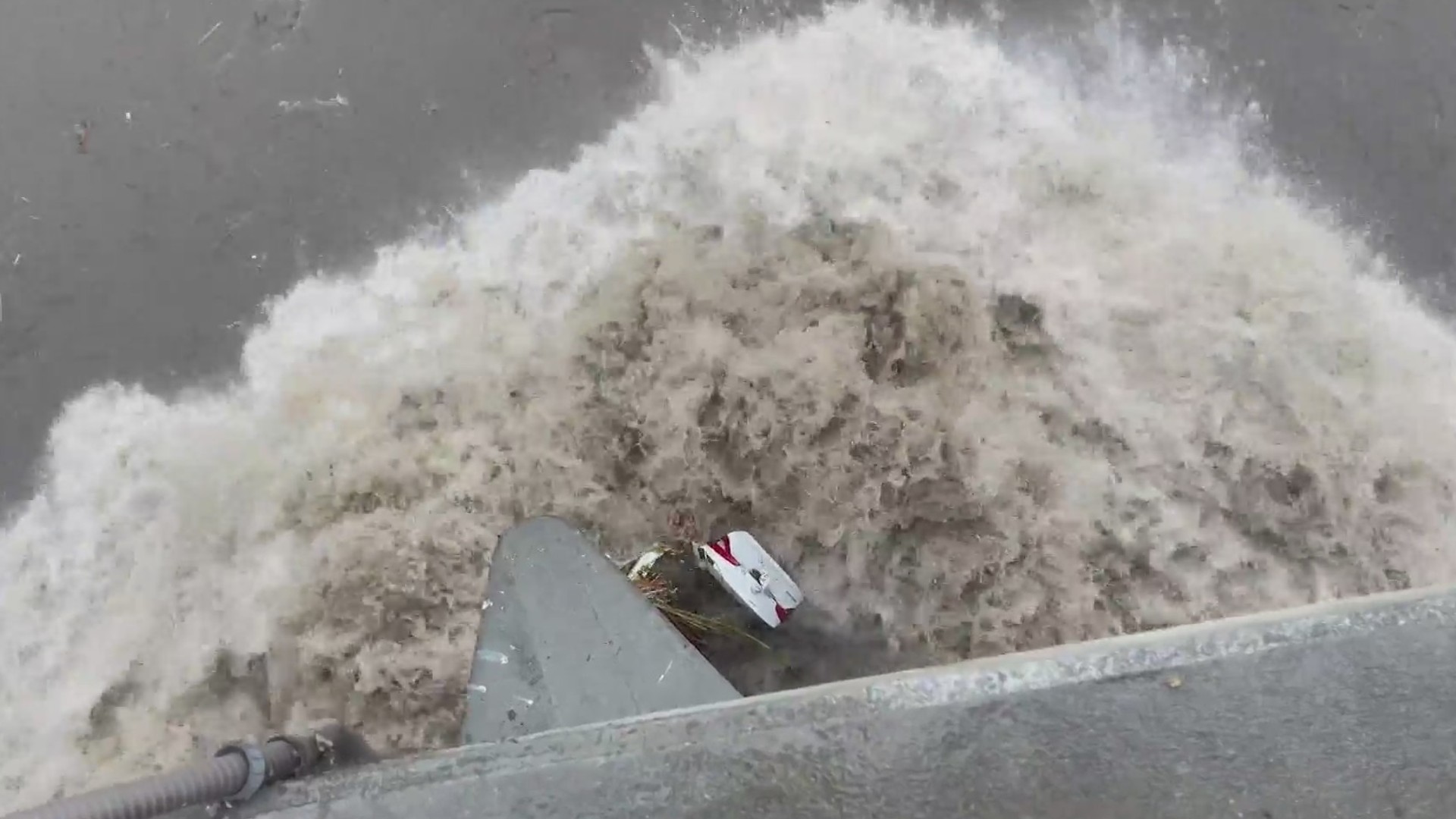 A car submerged in the Los Angeles River is seen on Dec. 14, 2021. (KTLA)