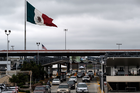 Cars drive in to Mexico at El Chaparral port of entry in Tijuana, Baja California state, Mexico, on June 17, 2019. (GUILLERMO ARIAS/AFP via Getty Images)