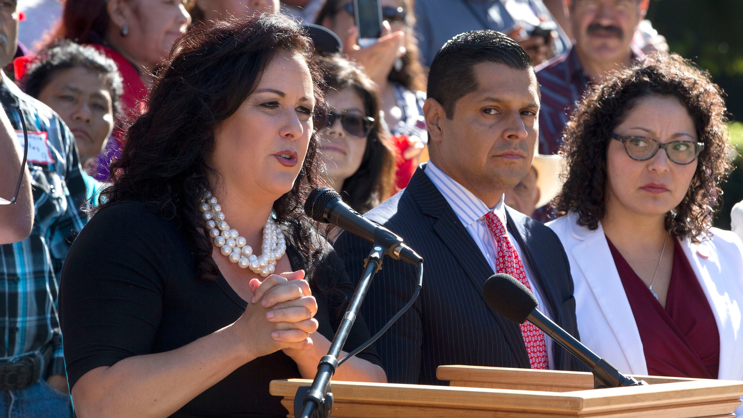 Assemblywoman Lorena Gonzalez, left, speaks at a rally in Sacramento on Aug. 25, 2016. (Rich Pedroncelli/Associated Press)