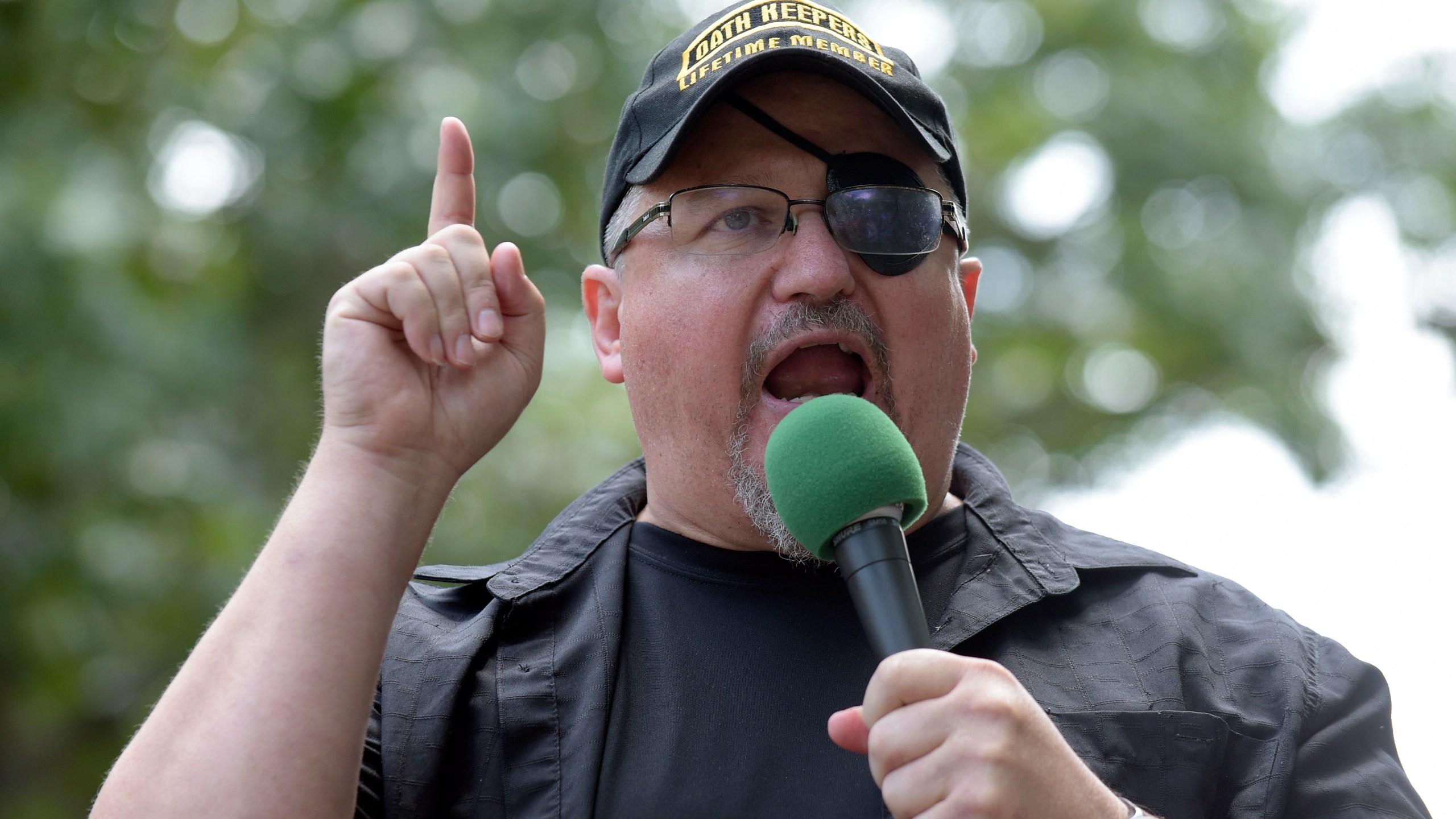 In this Sunday, June 25, 2017 file photo, Stewart Rhodes, founder of the citizen militia group known as the Oath Keepers speaks during a rally outside the White House in Washington. Rhodes has been arrested and charged with seditious conspiracy in the Jan. 6 attack on the U.S. Capitol. The Justice Department announced the charges against Rhodes on Thursday. (AP Photo/Susan Walsh, File)