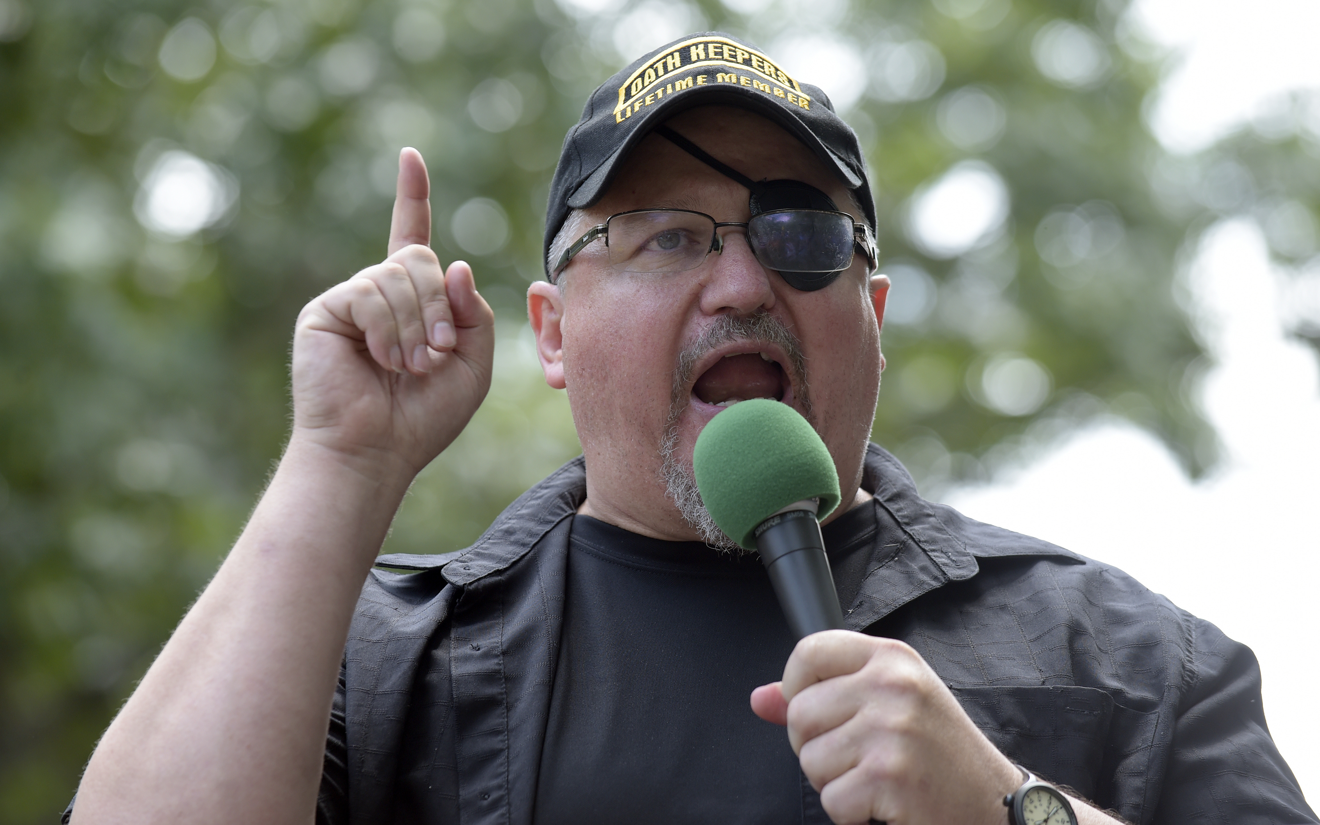 In this Sunday, June 25, 2017 file photo, Stewart Rhodes, founder of the citizen militia group known as the Oath Keepers speaks during a rally outside the White House in Washington. Rhodes has been arrested and charged with seditious conspiracy in the Jan. 6 attack on the U.S. Capitol. The Justice Department announced the charges against Rhodes on Thursday. (AP Photo/Susan Walsh, File)