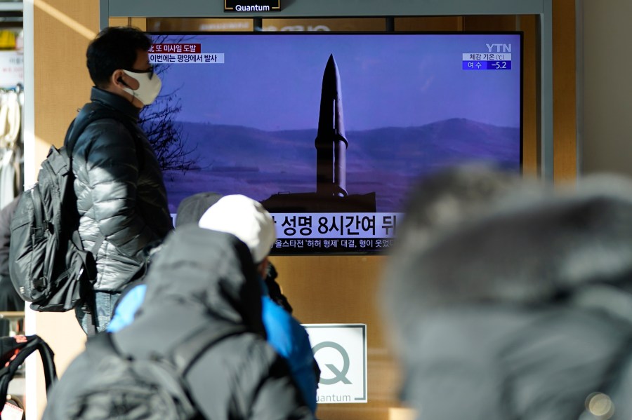 People watch a TV screen showing a news program reporting about North Korea's missile launch with a file image, at a train station in Seoul, South Korea, Monday, Jan. 17, 2022. North Korea on Monday fired two suspected ballistic missiles into the sea in its fourth weapons launch this month, South Korea's military said, with the apparent goal of demonstrating its military might amid paused diplomacy with the United States and pandemic border closures. (AP Photo/Lee Jin-man)