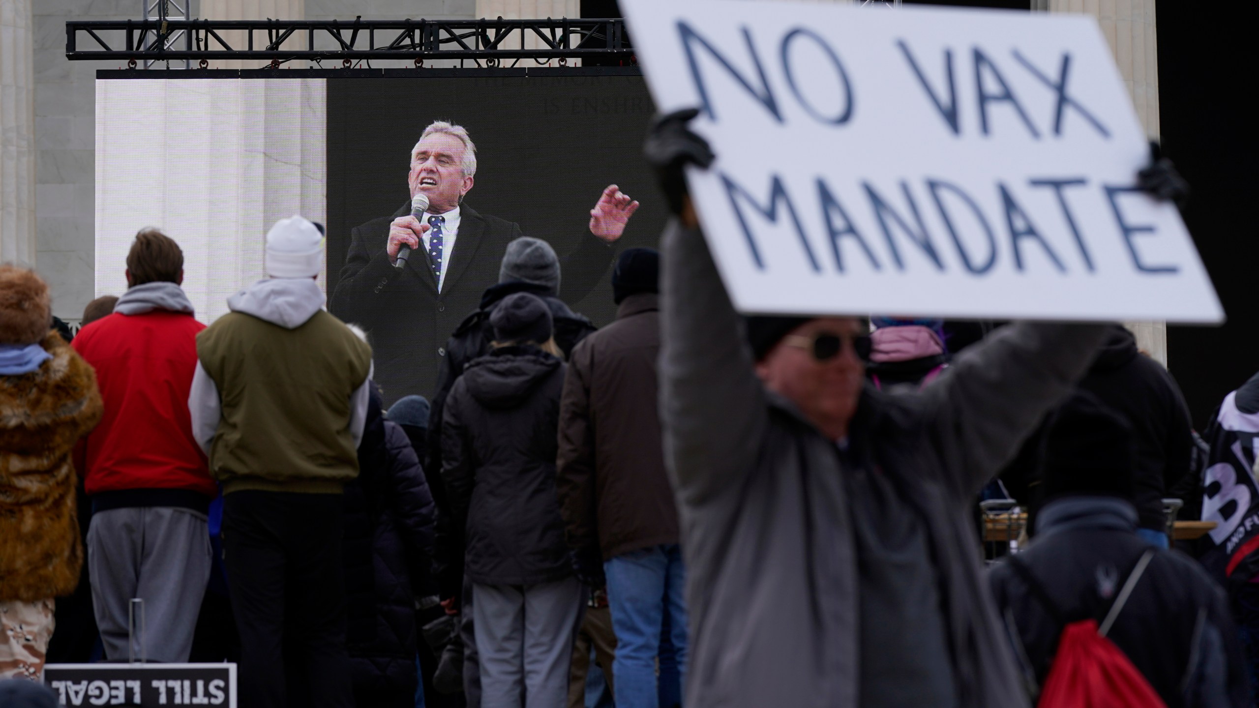 Robert F. Kennedy Jr., is broadcast on a large screen as he speaks during an anti-vaccine rally in front of the Lincoln Memorial in Washington, Sunday, Jan. 23, 2022. (AP Photo/Patrick Semansky)