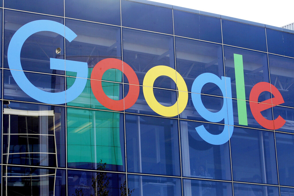 A sign is shown on a Google building at their campus in Mountain View, Calif., on Sept. 24, 2019. (AP Photo/Jeff Chiu, File)