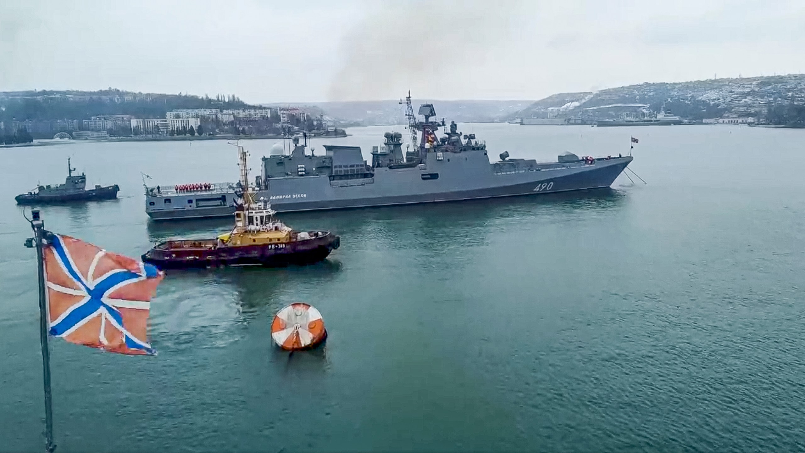 In this photo taken from video and released by the Russian Defense Ministry Press Service on Wednesday, Jan. 26, 2022, the Russian navy's frigate Admiral Essen prepares to sail off for an exercise in the Black Sea. Russia has launched a series of drills amid the tensions over Ukraine and deployed an estimated 100,000 troops near the Ukrainian territory that fueled Western fears of an invasion. (Russian Defense Ministry Press Service via AP)