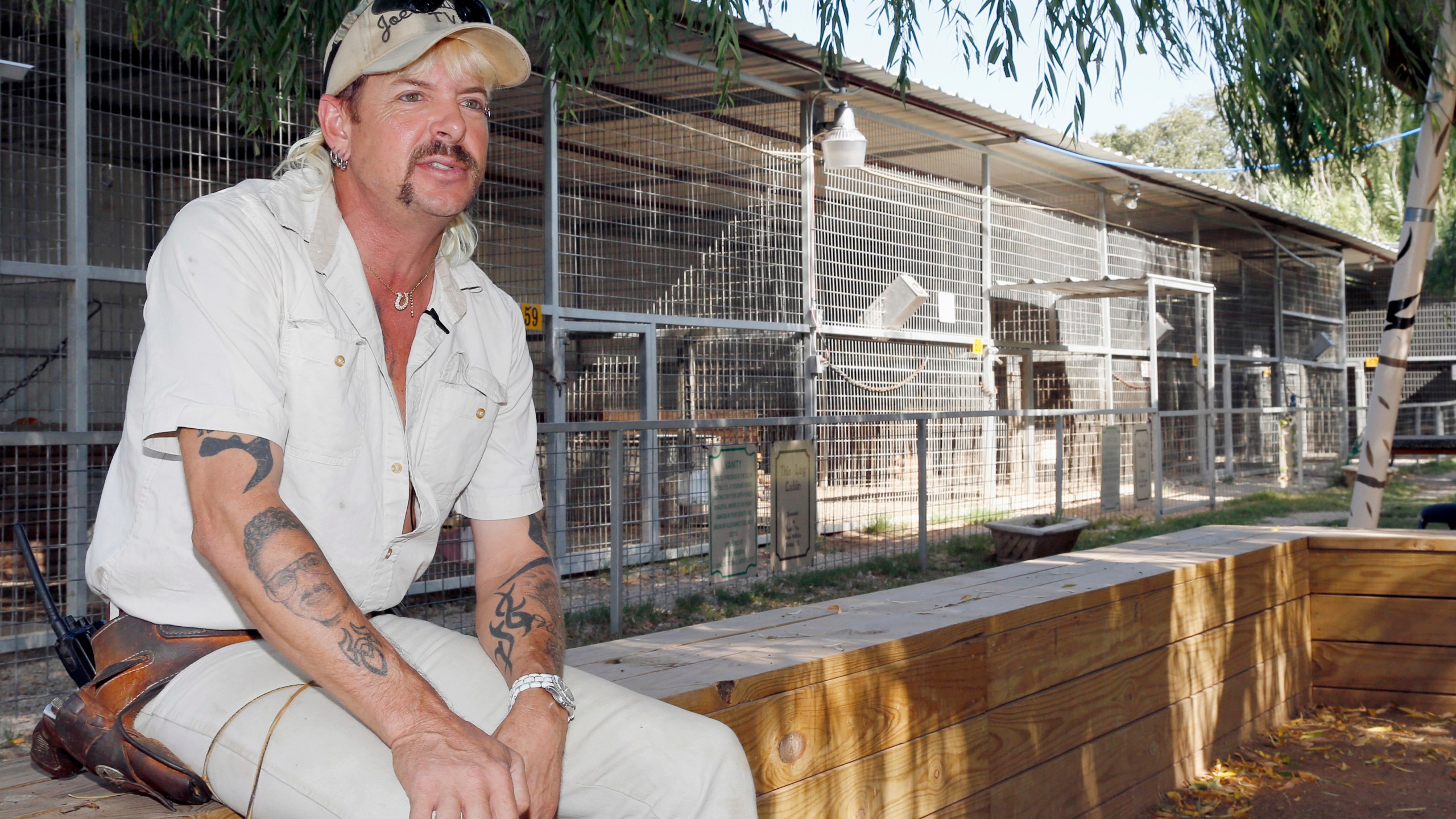 In this Aug. 28, 2013, file photo, Joseph Maldonado, aka Joe Exotic, answers a question during an interview at the zoo he runs in Wynnewood, Okla. (Sue Ogrocki/Associated Press)