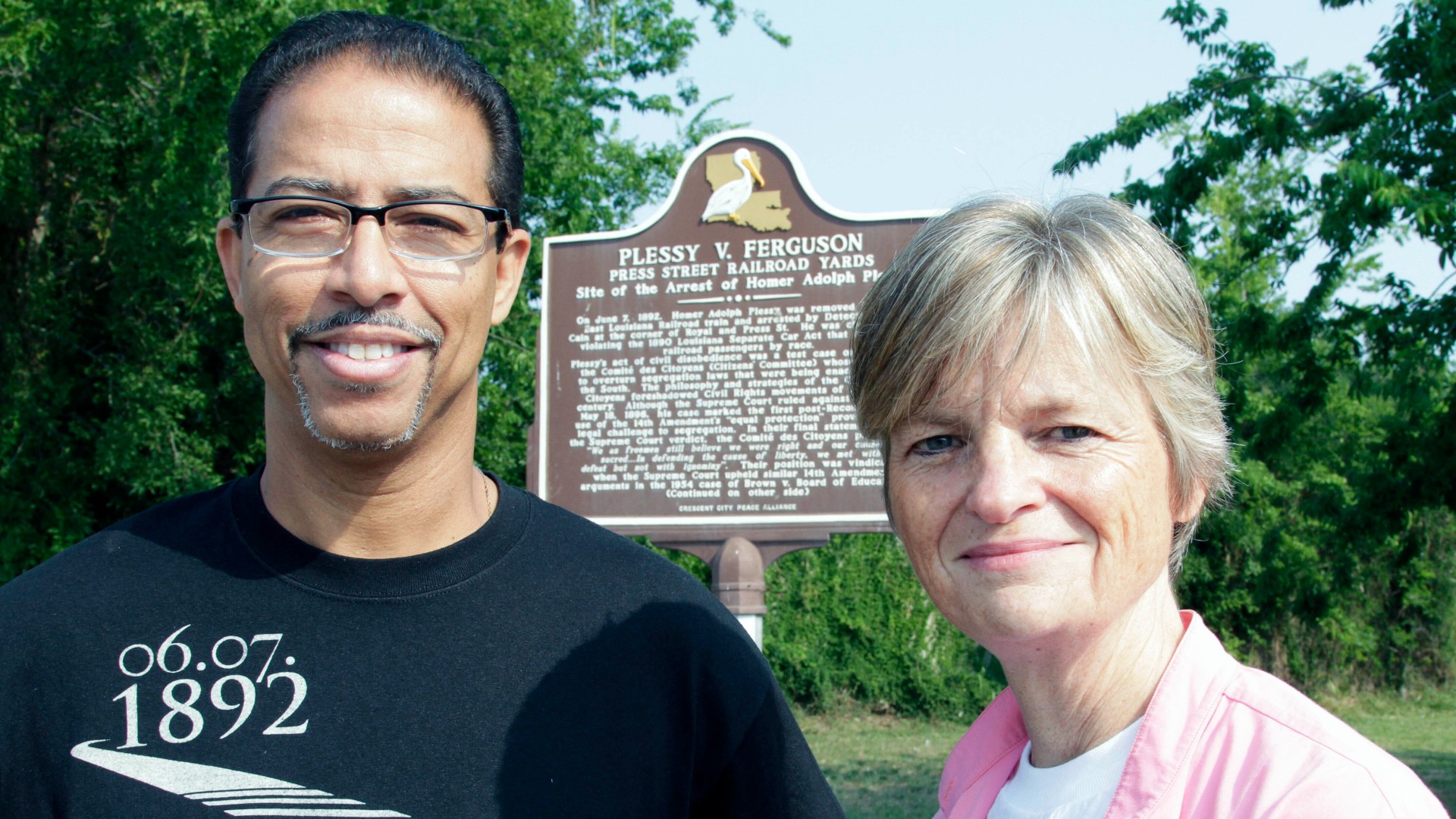 Keith Plessy and Phoebe Ferguson, descendants of the principals in the Plessy V. Ferguson court case, pose for a photograph in front of a historical marker in New Orleans, on Tuesday, June 7, 2011. Homer Plessy, the namesake of the U.S. Supreme Court’s 1896 “separate but equal” ruling, is being considered for a posthumous pardon. The Creole man of color died with a conviction still on his record for refusing to leave a whites-only train car in New Orleans in 1892. (AP Photo/Bill Haber, File)