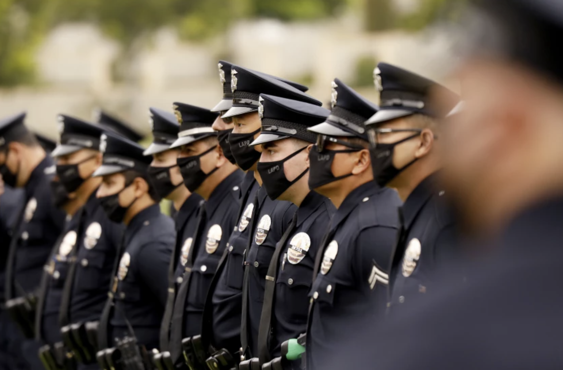 LAPD officers attend the funeral of LAPD Officer Valentin Martinez, the agency’s first sworn employee to die of complications from COVID-19, in August 2020. (Al Seib / Los Angeles Times)