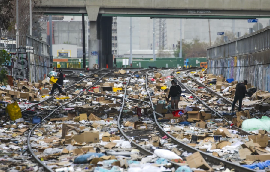 Debris litters Union Pacific train tracks in Lincoln Heights, where thieves stole items from rail cargo containers.(Irfan Khan/Los Angeles Times)