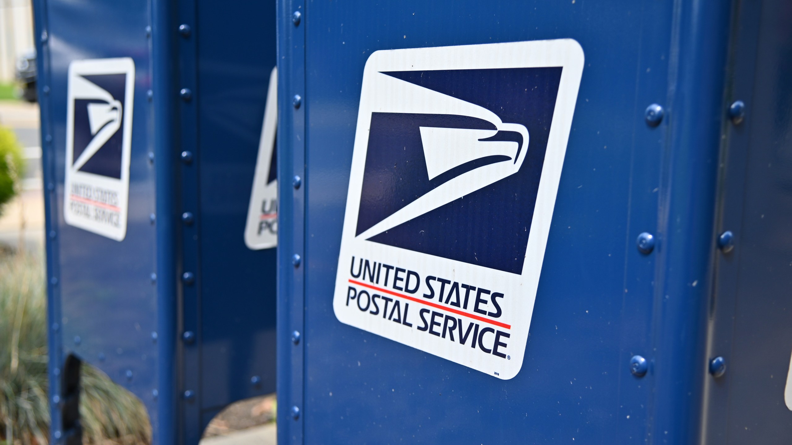 U.S. Postal Service mailboxes. (Photo by Theo Wargo/Getty Images)